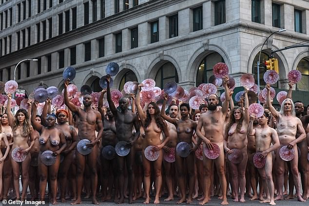 Naked demonstrators protest censorship at Facebook and Instagram offices